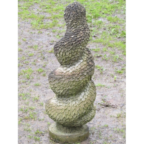 61 - A weathered cast composition stone garden ornament/cap finial in the form of a topiary type graduate... 