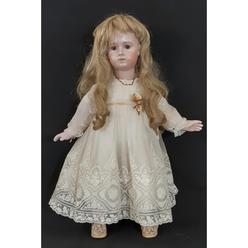 1291 - Reproduction of 19th century Jumeau bisque head  long faced triste bébé doll. Hand made, with jointe... 