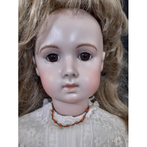 1291 - Reproduction of 19th century Jumeau bisque head  long faced triste bébé doll. Hand made, with jointe... 