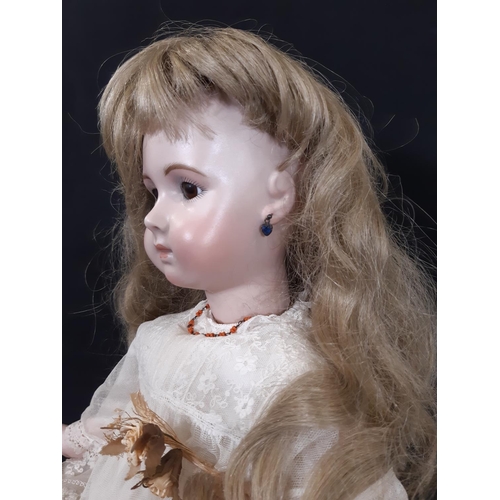 1291 - Reproduction of 19th century Jumeau bisque head  long faced triste bébé doll. Hand made, with jointe... 