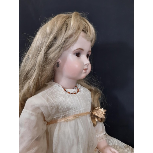 1291 - Reproduction of 19th century Jumeau bisque head  long faced triste bébé doll. Hand made, with jointe... 