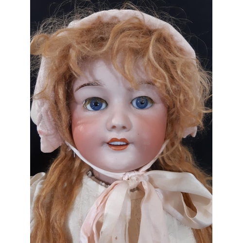 1293 - Early 20th century SFBJ bisque head character doll with jointed composition body, blue sleeping eyes... 