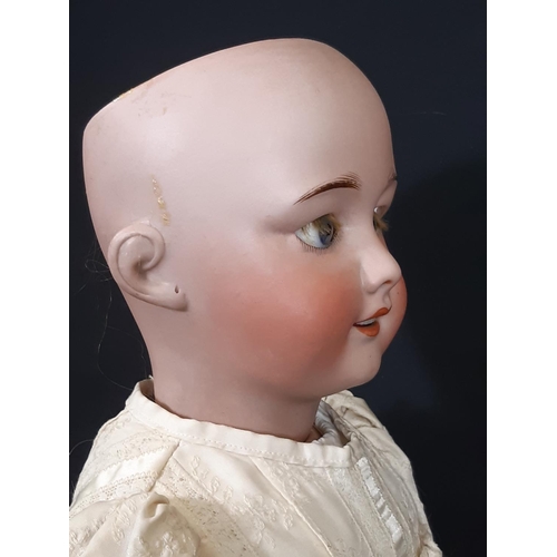 1293 - Early 20th century SFBJ bisque head character doll with jointed composition body, blue sleeping eyes... 