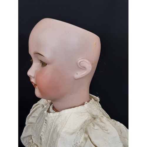 1293 - Early 20th century SFBJ bisque head character doll with jointed composition body, blue sleeping eyes... 