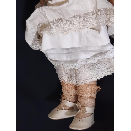 1293 - Early 20th century SFBJ bisque head character doll with jointed composition body, blue sleeping eyes... 