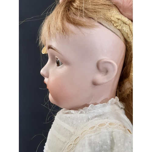 1295 - German bisque shoulder head doll by Kestner, mould 154, with jointed kid body, bisque lower arms and... 