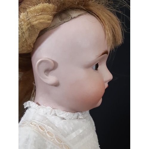 1295 - German bisque shoulder head doll by Kestner, mould 154, with jointed kid body, bisque lower arms and... 