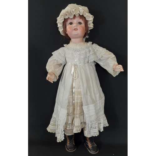 1297 - Large German bisque head doll by Armand Marseille circa 1900-1910, mould 390, with jointed compositi... 