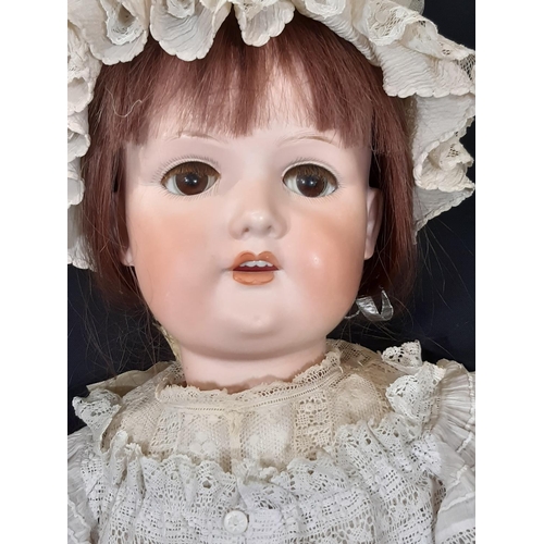 1297 - Large German bisque head doll by Armand Marseille circa 1900-1910, mould 390, with jointed compositi... 