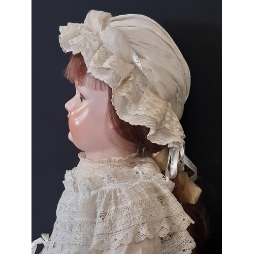 1297 - Large German bisque head doll by Armand Marseille circa 1900-1910, mould 390, with jointed compositi... 