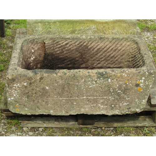 101 - A weathered rectangular carved stone trough with slightly tapered end, 80cm long x 52cm wide x 30cm ... 