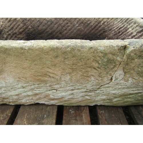 101 - A weathered rectangular carved stone trough with slightly tapered end, 80cm long x 52cm wide x 30cm ... 