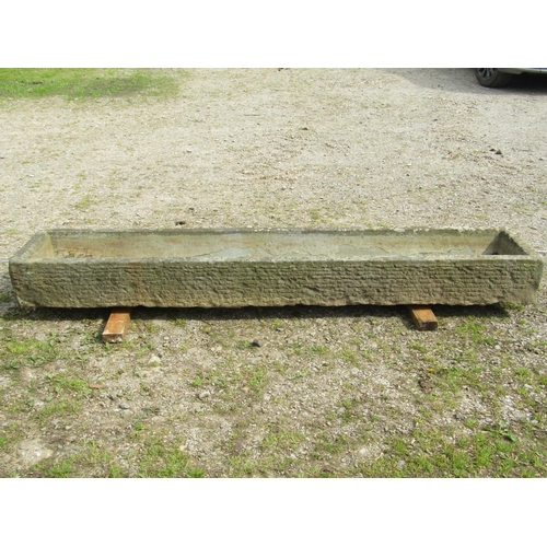 102 - A good weathered rectangular carved natural stone trough with tapered interior, 242cm long x 47cm wi... 