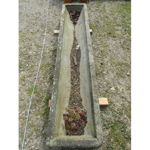 102 - A good weathered rectangular carved natural stone trough with tapered interior, 242cm long x 47cm wi... 