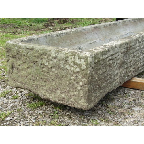 102 - A good weathered rectangular carved natural stone trough with tapered interior, 242cm long x 47cm wi... 