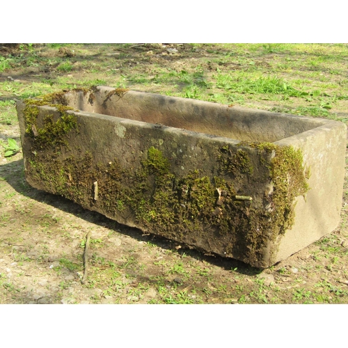 105 - A weathered rectangular natural stone trough, 93cm long x 38cm wide x 30cm high