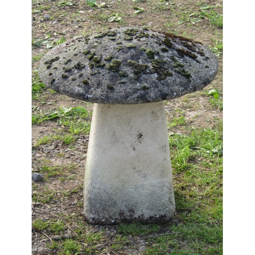 106 - A small weathered cast composition stone staddlestone and domed cap, approx 50cm diameter x approx t... 