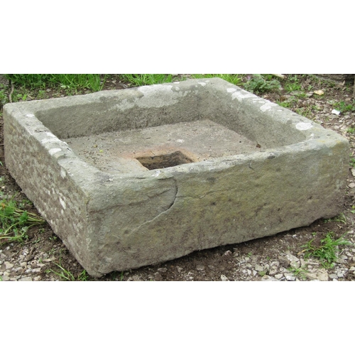 127 - A shallow weathered natural stone trough/sink with square central drainage hole 53 x 50 cm x 16 cm h... 