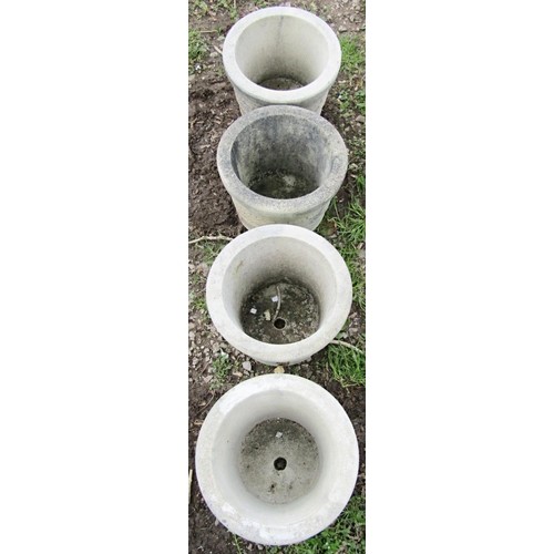 131 - A set of four weathered circular tapered planters with repeating acorn and oak leaf and banded detai... 