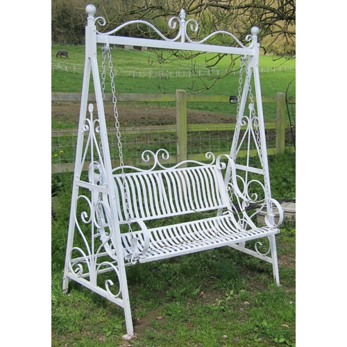 138 - A painted metal two seat garden swing raised on A framed supports with open scroll detail, 154 cm (f... 