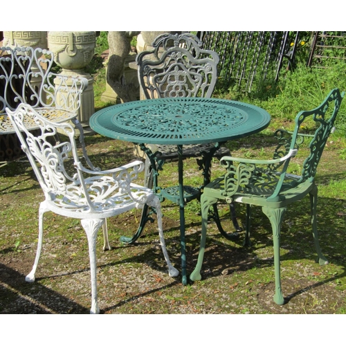 142 - A green painted cast aluminium garden terrace table with decorative circular pierced top 80 cm diame... 