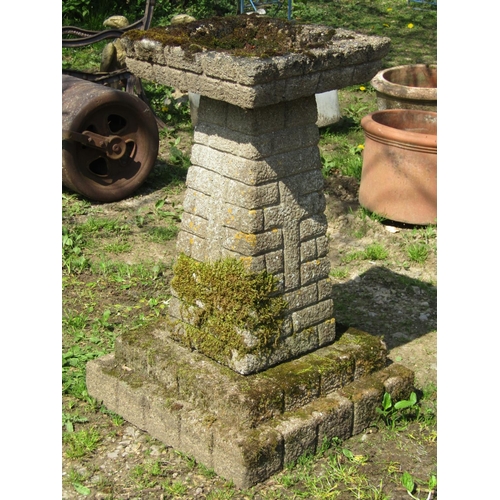 145 - A large weathered mock stone wall effect three sectional bird bath, the square top 45 cm raised on a... 