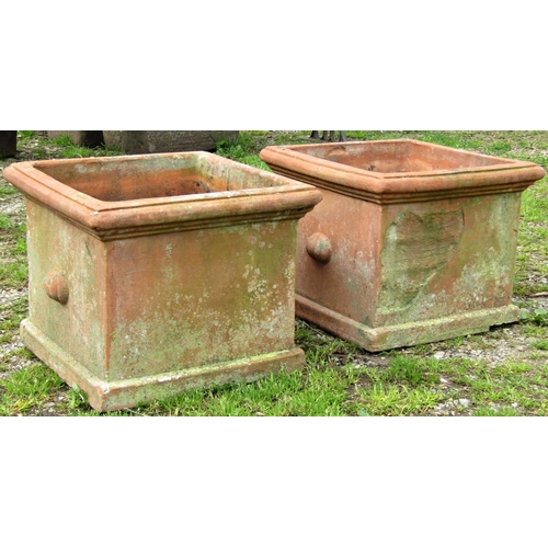 146 - A pair of weathered terracotta planters of square cut and moulded form, approximately 50 cm square x... 