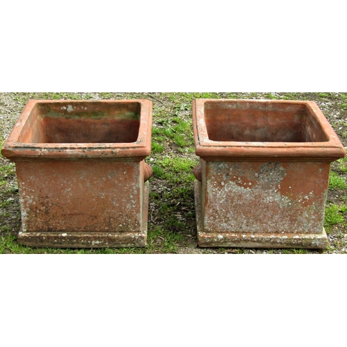 146 - A pair of weathered terracotta planters of square cut and moulded form, approximately 50 cm square x... 