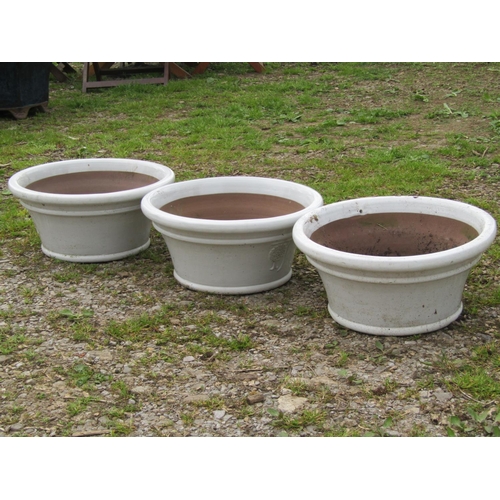 153 - Three contemporary  cream glazed terracotta squat circular flared planters with simple tree moulded ... 