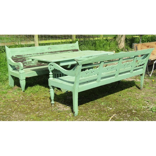 154 - A weathered light green painted rustic garden table, the overhanging rectangular slatted panelled to... 