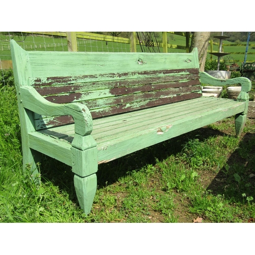 154 - A weathered light green painted rustic garden table, the overhanging rectangular slatted panelled to... 