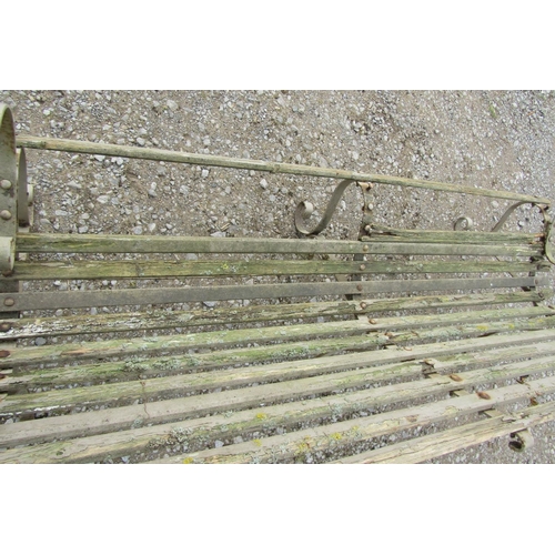 157 - A vintage weathered sprung steel garden bench with wooden lathes, 153 cm (5ft wide) together with a ... 