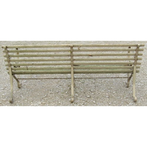 157 - A vintage weathered sprung steel garden bench with wooden lathes, 153 cm (5ft wide) together with a ... 