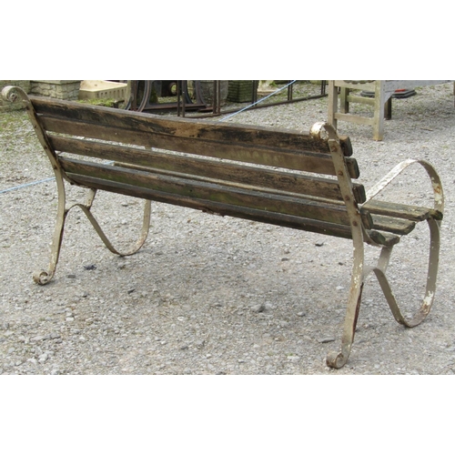 157 - A vintage weathered sprung steel garden bench with wooden lathes, 153 cm (5ft wide) together with a ... 