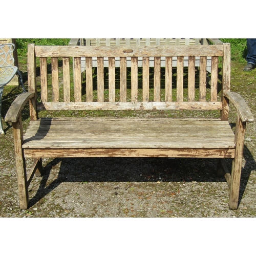 158 - A Canterbury Collection weathered hardwood garden bench with slatted seat, curved back and arms, 139... 