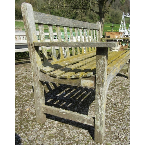 161 - A vintage weathered teak three seat garden bench with slatted seat and back probably a Lister exampl... 