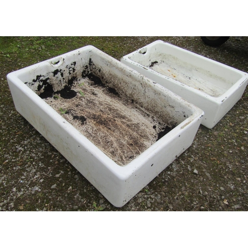 173 - A reclaimed rectangular Belfast sink 92 cm  long x 61 cm wide x 26 cm high, together with a similar ... 