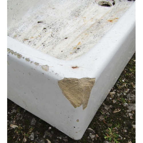 173 - A reclaimed rectangular Belfast sink 92 cm  long x 61 cm wide x 26 cm high, together with a similar ... 