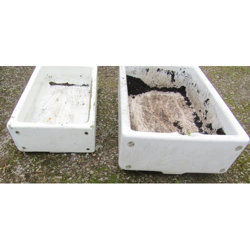 173 - A reclaimed rectangular Belfast sink 92 cm  long x 61 cm wide x 26 cm high, together with a similar ... 