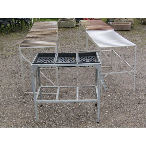 45 - Four aluminium greenhouse potting tables of varying size and design, two with wooden open slatted to... 
