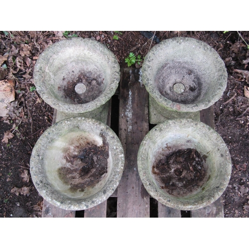 46 - Two pairs of weathered circular garden planters with repeating foliate detail (varying design), one ... 