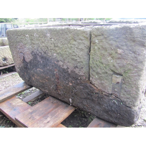 59 - A good weathered thick walled D shaped natural stone trough (af old repair), 112 cm wide x 68 cm dee... 
