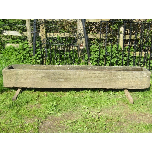 76 - A good weathered rectangular natural stone trough with tapered interior 242 cm long x 40 cm wide x 3... 