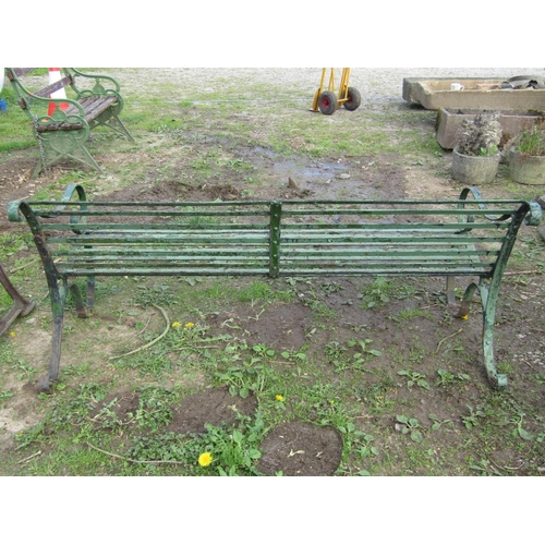 93 - A good quality heavy gauge sprung steel garden bench with strap work seat, open scrolled arms and pa... 