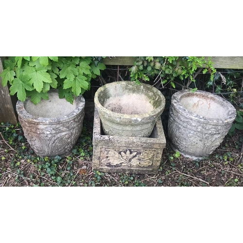 63 - A pair of weathered cast composition stone circular tapered planters with repeating fruiting vine, C... 