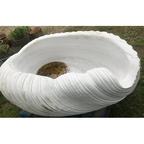 77 - A good quality carved Carrera marble bath in the form of a shell, approx 210cm long x 110cm wide x 6... 