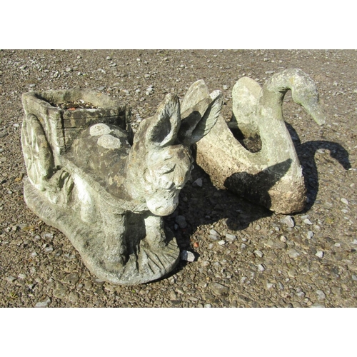 225 - Two novelty weathered cast composition stone planters one in the form of a swan, the other a donkey ... 