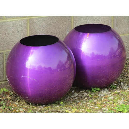 240 - A pair of Lune contemporary purple metallic globular planters approximately 45 cm in diameter, toget... 