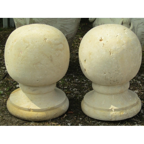 246 - A pair of large buff coloured stone sphere pier cap finials, 40 cm diameter approximately