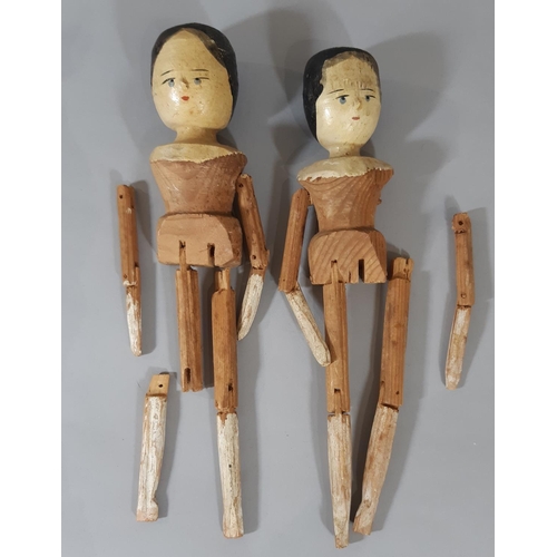 1290 - Four dolls including 2 19th century Grödnertal 'Penny Wooden' dolls with Gesso faces, painted black ... 